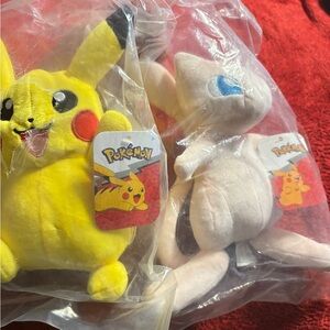 Pokemon Plush Pikachu and Mew 9” plush . NWT sealed